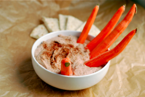 Hummus with carrot fingers